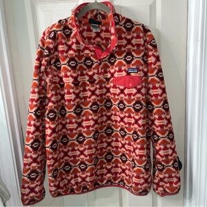 Patagonia Women's Red and Orange Patterned Fleece Jacket